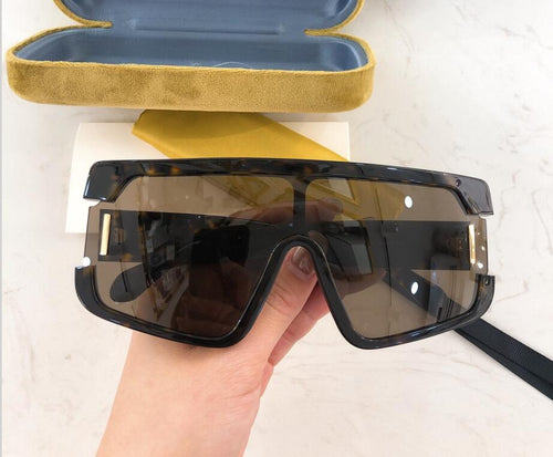 black oversized sunglasses